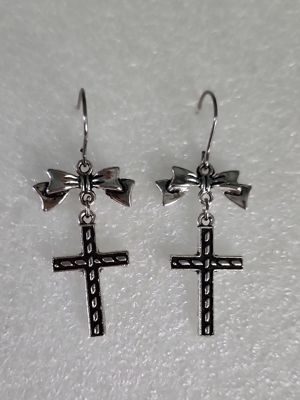 Hand Crafted Silver Bow & Cross Dangle Earrings